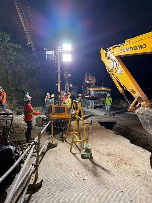 Workers executing emergency bypass plan.