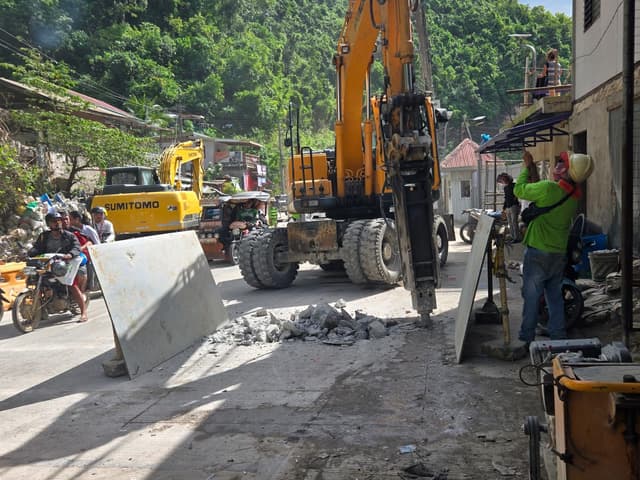 Workers executing emergency bypass plan.