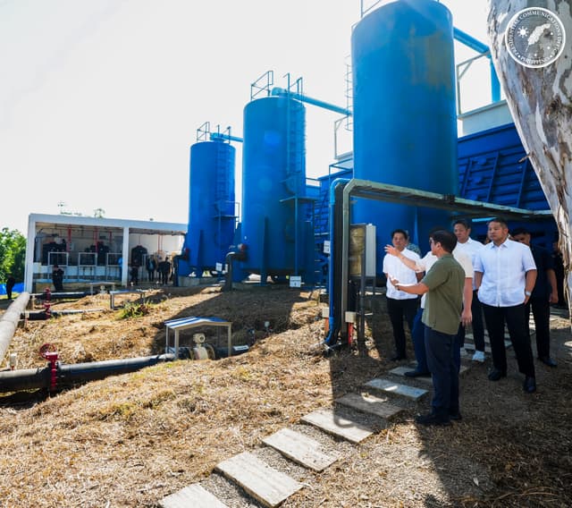 The president of the Philippines inspecting the water treatment plant.